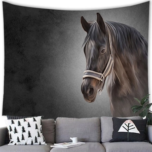 Detail of horse head tapestry hanging over a gray sofa in a modern artistic living room