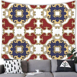 Bohemian geometric floral tapestry hanging over a modern sofa in a cozy room decor