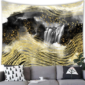 Close-up of ink landscape tapestry with golden birds above a grey sofa background