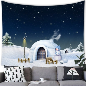 Detail of winter tapestry featuring cute snowman and igloos on a living room wall