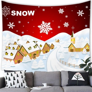 Christmas snowman wall tapestry with SNOW typography hanging above a grey sofa