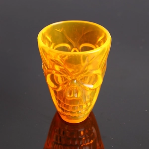 Gothic 3D skull drinking mug in translucent amber yellow for Halloween party decor