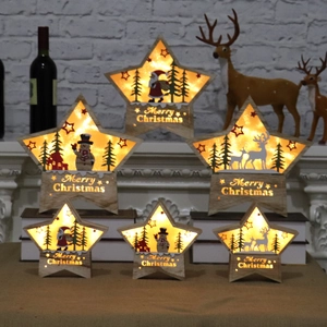 Lighted wooden Christmas star ornaments with LED lights and festive deer snowman carvings