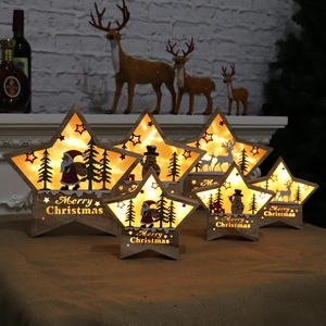 Lighted wooden Christmas star ornaments with LED silhouette designs for home decor
