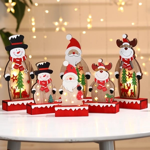 Lighted wooden Christmas ornaments with Santa, Snowman, and Reindeer figurines