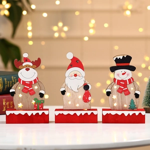 Three-piece glowing wooden Christmas figurines featuring Santa, reindeer, and snowman with LEDs