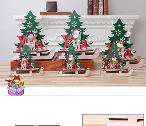 Detailed view of DIY wooden Christmas sleigh ornaments with painted Santa and reindeer