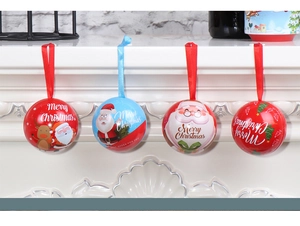 Christmas tinplate ball ornaments with Santa and reindeer patterns hanging on a rack