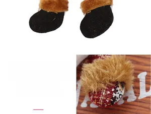 Detail of plush Christmas boot ornaments in red plaid and black with faux fur trim