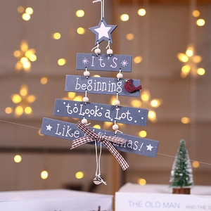Blue-grey wooden Christmas tree wall hanging with bell and red bird decoration