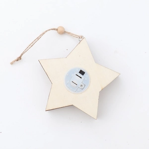 Wooden star Christmas tree ornament with LED light and hanging rope on white background