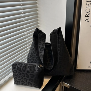 Retro black leopard print tote bag set with matching pouch and vintage texture