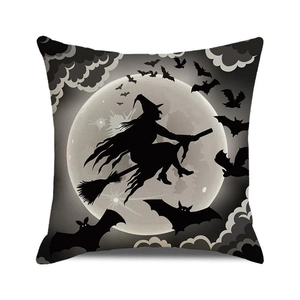 Macro detail of the woven linen texture on a Halloween witch silhouette pillow cover