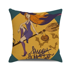 Detail of Halloween pillow case with cartoon witch and pumpkin on linen texture