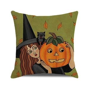 Close-up of the woven linen texture and cartoon witch pumpkin print on square cushion cover