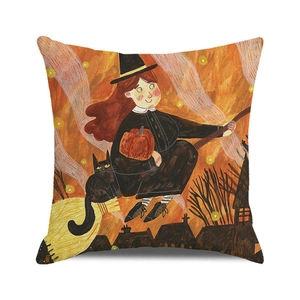 Detail of Halloween pillow case with cartoon witch and black cat on linen fabric