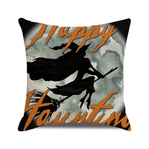 Detail of Happy Haunting Halloween pillow cover with witch silhouette and linen texture