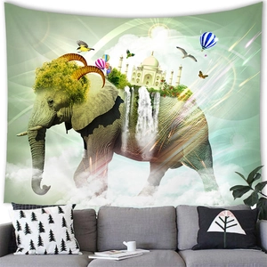 Surreal African elephant wall tapestry featuring Taj Mahal elements and waterfalls on grey wall