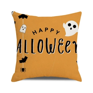 Macro shot of Halloween throw pillow cover with orange linen texture and ghost graphics