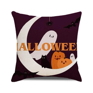 Close-up of Halloween cushion cover texture featuring ghosts, pumpkins and moonlight