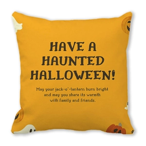Macro detail of Halloween cushion showing peach skin fabric and pumpkin ghost print