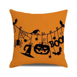 Detailed view of Halloween pillowcase featuring black bats, spiders and BOO lettering