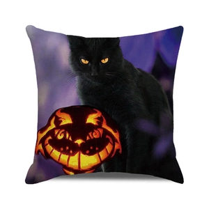 Detail of Halloween pillow case featuring a black cat and glowing pumpkin lantern print