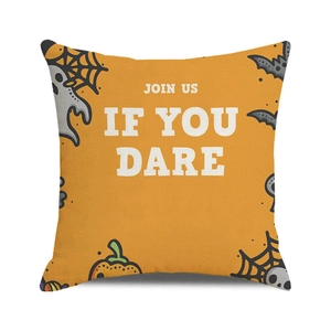 Detail of Halloween throw pillow with spider web, bats, and Join Us If You Dare text