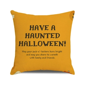 Detail of linen texture and Haunted Halloween text print on square festive pillowcase