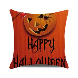 Detail of Happy Halloween pillow case with pumpkin, spider and axe on cotton linen texture