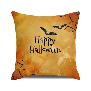 Detail of square Halloween cushion cover featuring Happy Halloween text and bats