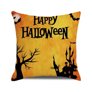 Detail of Halloween pillow case with orange gradient background and silhouette castle design
