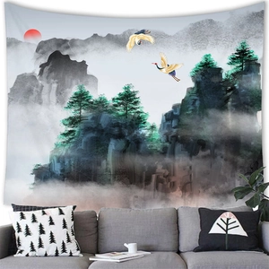 Detail of traditional Chinese ink landscape tapestry with mountains and red sun