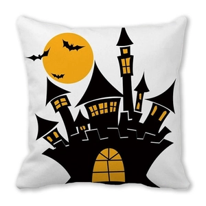 Detail of Halloween pillowcase with black castle silhouette and yellow full moon print