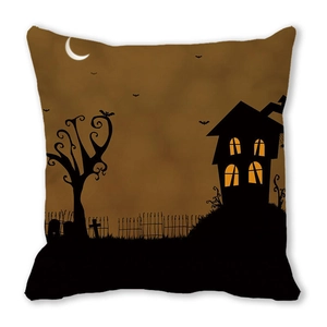 Detail of Halloween silhouette cushion cover featuring a haunted house and bats design