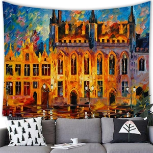 Detail of Impressionist street scene tapestry hanging over a grey sofa in a modern room