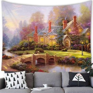 Detail of artistic countryside landscape tapestry hanging over a sofa in a modern living room