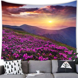 Detailed landscape wall tapestry featuring purple flowers and sunset mountains over a sofa