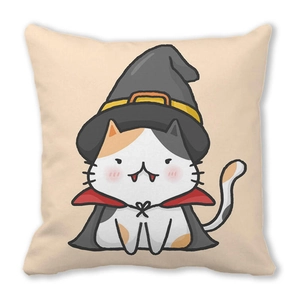 Detail of square Halloween cushion cover with cartoon cat in wizard hat on peach skin fabric