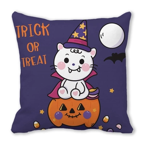 Detail of Halloween pillowcase featuring a white cat in a wizard hat with a pumpkin