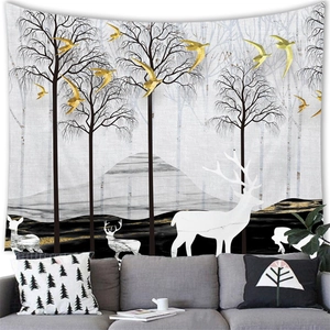 Detail of artistic wall tapestry with white deer, golden birds, and marble textured mountains