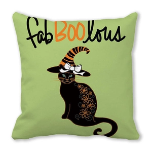 Detail of mint green Halloween pillow case with cute black cat and fabBOOlous lettering