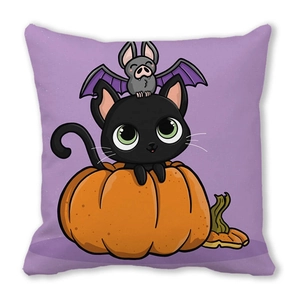 Detailed view of Halloween cushion featuring a cute black cat sitting in a pumpkin