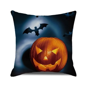 Detail of square Halloween pillowcase featuring carved orange pumpkin and bats