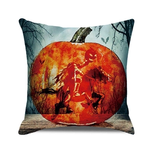 Macro detail of Halloween pillow cover featuring a watercolor pumpkin and headless horseman