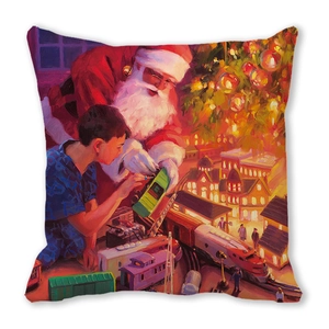 Detailed close-up of a festive Christmas cushion featuring a Santa Claus watercolor painting