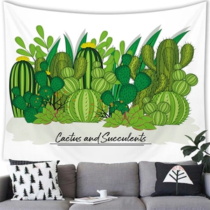 Detail of watercolor cactus wall tapestry showing the fabric texture in a cozy living room