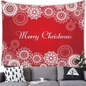Rood Merry Christmas wandtapijt met witte sneeuwvlokken boven een grijze bank in de woonkamer