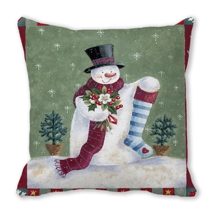 Christmas snowman decorative pillow with festive scarf and berry details on white background