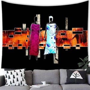 Detail of abstract African art tapestry showing two women in ethnic dress on a black wall hanging